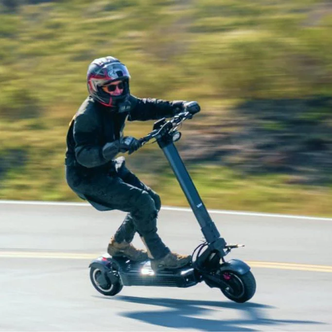 A rider speeding on the EMOVE Roadster, showcasing why it’s considered one of the fastest e scooters for thrill seekers.