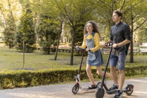 Riding E Scooters In Park