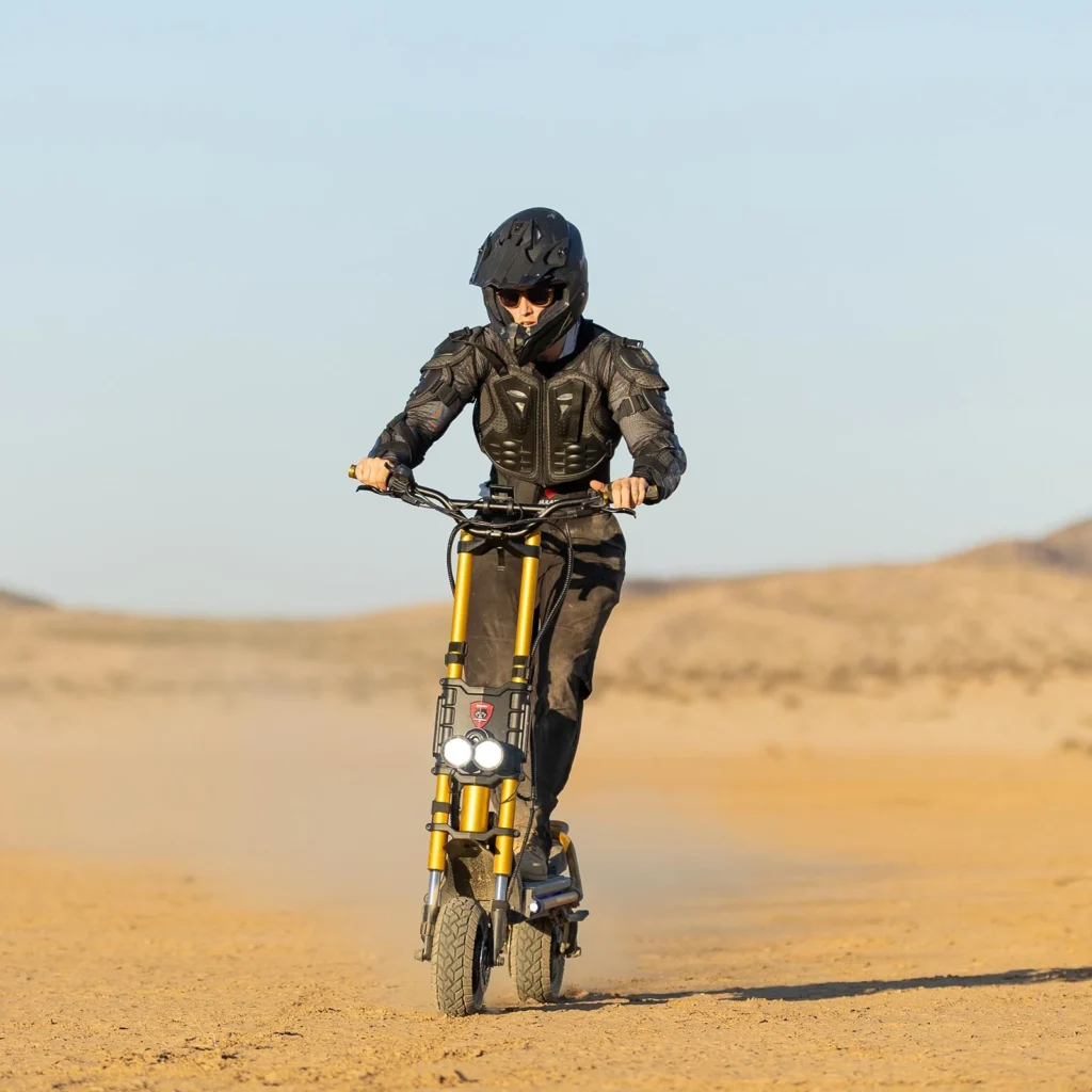 A rider powering through the desert on the Kaabo Wolf King GTR, built as one of the fastest e scooters for off-road adventure.