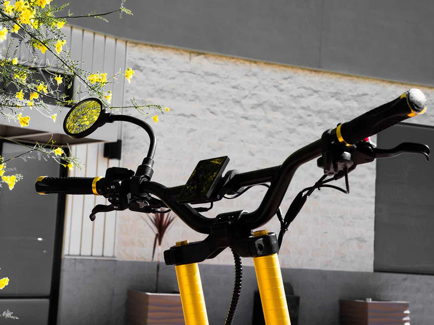 Long-arm rotatable rear side view mirror with a clamp mount, designed for better visibility and safety on e scooters.